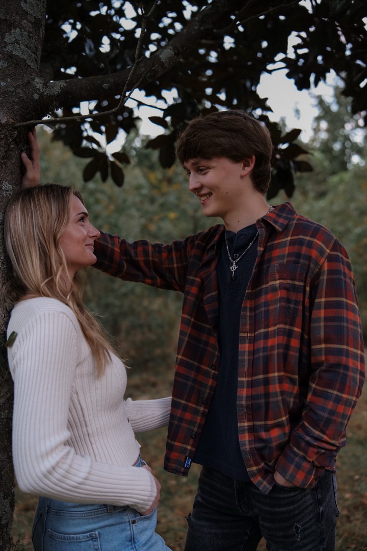 Couple under a magnolia tree